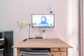 Enjoy Living and Homey Studio Dave Apartment By Travelio